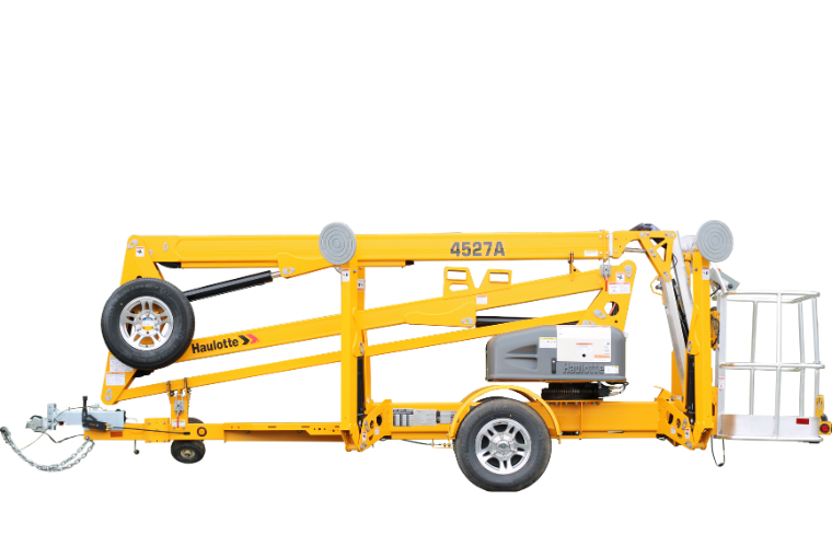 Towable boom lifts